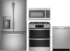 a silver refrigerator freezer next to a stove and microwave