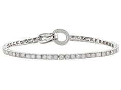 2.00ctw round white diamond, rhodium over 14k white gold tennis bracelet. Measures approximately 1/8"W and has a fold-over clasp. Elegant White Gold Tennis Bracelet With Channel Set, Elegant White Gold Tennis Bracelet Channel Set, White Gold Diamond Tennis Bracelet - Channel Set, White Gold Channel Set Diamond Bracelet, Broken Chain, Tennis Bracelet, Cultured Pearls, Gold Material, Diamond Gemstone