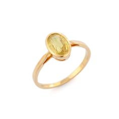 For Sale on 1stDibs - Yellow Sapphire Solitaire Ring in 18K Yellow Gold is a perfect minimalist jewelry to match with every outfit of your wardrobe. It's just a simple ring Yellow Sapphire Oval Ring In Fine Jewelry Style, Classic Yellow Sapphire Round Rings, Yellow 14k Gold Oval Rings, Classic Oval Yellow Sapphire Ring, Elegant Yellow Oval Sapphire Ring, Elegant Yellow Open Ring, Yellow Sapphire Oval Promise Ring, Oval Yellow Sapphire Promise Ring, Elegant Oval Yellow Sapphire Ring