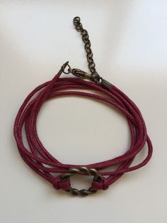 "BUY TWO GET A THIRD FOR FREE!! (please, don't add your free product to your shopping cart or you will be charged for it. Pick 1 product and leave the full name of it in the \"Note to enjoywelrydesign\" Box during checkout.)This is a waxed cotton Karma bracelet with an alloy metal bronze ring charm. What goes around, comes around. Wear your bracelet as a reminder, to keep the circle positive, peaceful and loving. The bracelet is adjustable and fits wrists from 51/2'' to 81/2\" (14cm to 22cm). Fi Trendy Waxed Cord Braided Bracelet As Gift, Bohemian Wrap Bracelet With Adjustable Cord, Trendy Braided Waxed Cord Bracelets As Gift, Trendy Bracelets With Adjustable Waxed Cord, Adjustable Cord Friendship Bracelets, Trendy Waxed Cord Braided Bracelets For Gifts, Adjustable Cord Wrap Bracelet As A Gift, Adjustable Cord Wrap Bracelet For Friendship, Trendy Braided Bracelets With Waxed Cord