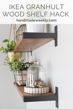 two shelves with plants and jars on them, one shelf has a glass dome in it