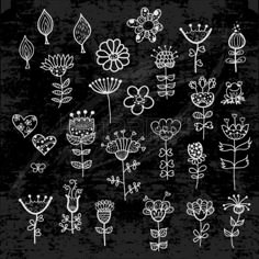 a bunch of flowers drawn in chalk on a blackboard