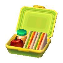 an open yellow lunch box filled with sandwiches and fruit on top of a white surface