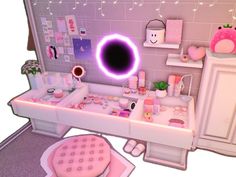 a bathroom with pink accessories and lights on the wall, in front of a mirror