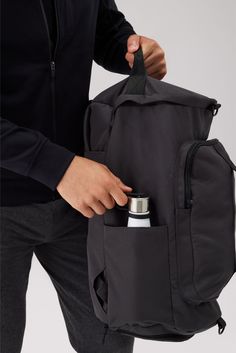 From the office to the gym—and personal item to carry-on—this reinforced canvas backpack seamlessly transforms into a spacious duffle. It features a dedicated shoe compartment, a padded laptop sleeve, and accessible pockets (for your most reached-for items). Mack Weldon offers the best and most comfortable premium clothing for anything from working out to casual living. Our incredibly soft and smooth fabric will change your outlook on men's clothing. Come see why we are the one of the top luxury Sporty Backpack With Functional Pockets, Everyday Duffle Bag Backpack With Functional Pockets, Functional Everyday Gym Backpack, Functional Backpack With Luggage Sleeve For Outdoor Activities, Everyday Multi-functional Gym Bag With Pockets, Everyday Functional Waterproof Travel Bag, Sporty Backpack With Functional Pockets For Everyday Use, Everyday Waterproof Functional Duffle Bag, Waterproof Functional Canvas Bags