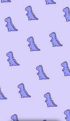 blue dinosaurs are all over the purple background