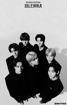 the group is posing together in black and white