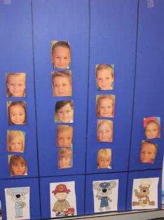 a bulletin board with pictures of children's faces on it in front of a blue wall