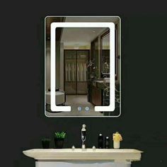 a bathroom mirror that is on the wall