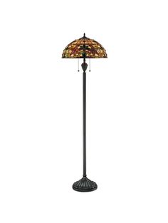 a floor lamp with a stained glass shade on the top and bottom part of it