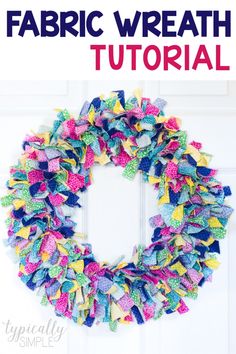 a colorful wreath hanging on the front door with text overlay that reads, fabric wreath tutor