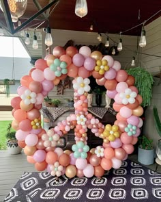 a number made out of balloons sitting on top of a table