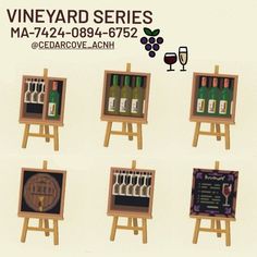 there are six wine racks with bottles and glasses on each rack, along with a sign that says vineyard series ma - 744 - 088