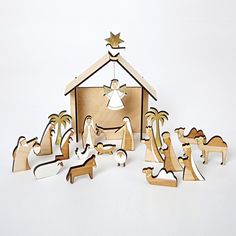 a wooden nativity scene with the birth of jesus