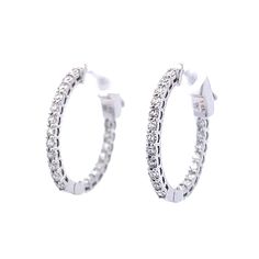 These modern classic hoop earrings feature diamonds on both the interior and exterior of the hoop. Forty (40) round brilliant cut diamonds bring a large amount of sparkle from every angle. Finished in 14k white gold, hoop earrings such as these are a staple in any jewelry collection. 77 Diamonds, Modern Wedding Band, White Gold Hoop Earrings, Diamond Hoop Earrings, Shop Engagement Rings, Sapphire Engagement, Engagement Rings Sapphire, Jewelry Earrings Hoops, Gold Hoop