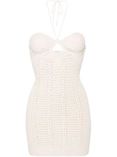 ecru cotton blend crochet knit semi-sheer construction halterneck tie fastening sleeveless straight hem above-knee length Elegant Knit Mini Dress For Beach, Elegant Knit Mini Dress For The Beach, Chic White Crochet Halter Neck Dress, Chic Knit Halter Neck Dress, Fitted Knitted Mini Dress For Beach, Fitted Knitted Mini Dress For Vacation, Chic Sleeveless Knitted Mini Dress, Chic Fitted Crochet Knit Dress, Fitted Mini Crochet Dress With Open Knit