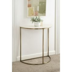 Introducing our Dorrah half-circle console table, the perfect addition to any home's entryway! Crafted with high-quality materials, this entryway table boasts a sturdy and durable design that is built to last. The antique brass metal base and the white authentic marble tabletop make for a classic color pairing. The half-circle shape is perfect for small or narrow entryways, providing ample space for displaying decor or storing everyday essentials. The compact size of the table also makes it a gr Half Moon Table Decor, Marble Console Table Entryway, Gold Entryway Table, Gold Entryway, Behind Couch Table, Small Entryway Table, Table For Entryway, Half Moon Table, Entry Way Table