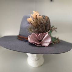 I Customized This Hat Myself With A Leather Feather Band And Metallic Pink Leather Flower. Feather Piece Is Made Of Pheasant. Hat Is A Shyanne Brand Hat That Is One Size In Grey. Artisan Hat With Curved Brim And Feathers, Custom Curved Brim Hat With Feathers, Feather Hat Accent, Western-themed Felt Hat With Feathers, Western-themed Fedora With Feather Trim, Hat Feathers, Western Hat, Leather Flower, Western Hats