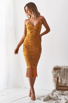 The Khaleesi Dress in Mustard is a gorgeous lace midi dress with fringe detail. This lace up back dress will compliment your curves. The Khaleesi Dress is a stunning wedding guest dress for the summer or for other black tie occasions. Available in other colors on our website, Type "Khaleesi Dress" in the search bar to see all the other colors available to you.Two Sisters the Label dresse Midi dress with a thick, non-sheer lining Back zipper Adjustable lace-up back for a more customized and secur Khaleesi Dress, Gaun Koktail, Lace Up Back Dress, Cocktail Sauce, Nye Outfits, Cocktail Dress Wedding, Dress Attire, Lace Midi Dress, Guest Outfit