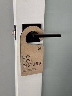 a door handle with a do not disturb sign on it