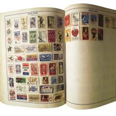 an open book with stamps on it and the pages are lined up in different colors