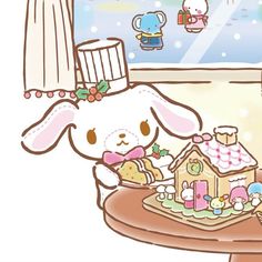 a cute little bunny sitting in front of a cake with some decorations on top of it