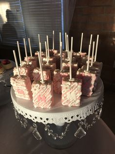 there are many desserts that are on the cake platter and ready to be eaten