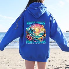 Embrace the serene vibes of the ocean with our Happiness Comes In Waves Hooded Sweatshirt. This cozy and stylish hoodie is perfect for beach lovers, surfers, and anyone who finds joy in the waves. Whether you're heading to the beach, planning a summer vacation, or just want a comfortable piece for everyday wear, this sweatshirt has got you covered. Features: High-Quality Material: Made from soft, durable fabric to keep you warm and comfortable. Unique Design: "Happiness Comes In Waves" print captures the essence of beach life and relaxation. Perfect Fit: Available in various sizes to ensure the perfect fit for everyone. Versatile Wear: Ideal for beach outings, casual day wear, or cozy nights in. Great Gift Idea: Perfect for birthdays, holidays, or just because - a thoughtful gift for beach Blue Relaxed Fit Hoodie For Leisure, Blue Hoodie For Leisure, Blue Hooded Sweatshirt For Leisure, Casual Surfing Hoodie Sweatshirt, Blue Hooded Hoodie For Leisure, Hooded Letter Print Sweatshirt For Surfing, Casual Letter Print Hoodie For Beachwear, Long Sleeve Hoodie With Letter Print For Surfing, Hooded Sweatshirt With Letter Print For Surfing