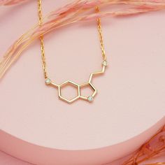 14k 18k Gold Diamond Serotonin Molecule Necklace, Happiness Hormone Necklace, Molecule Jewelry Gift for Women, Doctor Necklace Serotonin is a modern symbol of happiness. Serotonin molecules interact with receptors in the brain to induce feelings of happiness, satisfaction, and relaxation. Serotonin is a thoughtful gift for someone you wish happiness. Our gold diamond necklaces are perfect choice for a Christmas, Mother's Day, valentine's day, birthday, wedding, anniversary, graduation, engagemen Serotonin Aesthetic, Doctor Necklace, Molecule Jewelry, Serotonin Necklace, Doctor Jewelry, Serotonin Molecule, Molecule Necklace, Medical Jewelry, Pretty Jewelry Necklaces