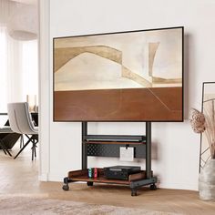 a flat screen tv mounted to the side of a wall