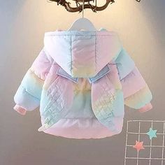 Introducing our Girls Unicorn Winter Jacket, a fashionable and enchanting addition to your little girl's winter wardrobe. This colorful unicorn-themed jacket is perfect for keeping her warm and stylish during the colder months. Available in vibrant rainbow colors, as well as classic white and cheerful yellow, this jacket features a fun and whimsical unicorn theme that your little one will love.Designed as a parka snowsuit, this jacket is crafted to provide warmth and comfort in winter conditions Playful Pink Winter Outerwear, Rainbow Long Sleeve Winter Outerwear, Playful White Long Sleeve Outerwear, Pastel Long Sleeve Outerwear For Fall, Playful Multicolor Long Sleeve Outerwear, Colorful Long Sleeve Winter Outerwear, Colorful Long Sleeve Outerwear For Winter, Unicorn Wings, Colorful Unicorn