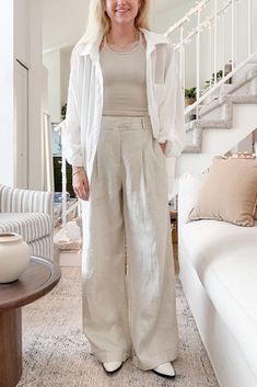 Crafted with the softest flowy linen, these effortless pants are perfect to bring along wherever you go this summer! The Lakeside 100% Linen Pants feature a wide leg silhouette, woven linen fabric, natural color, pleats, cuffed hemline, zipper and button closure. Style these pants with one of our basic tanks and a cardigan! Details & Sizing Wide leg Woven linen fabric Pleats Cuffed hemline Natural color Zipper and button closure Gabriella is wearing a size S Fabric 100% Linen Dimensions S: Waist: 26" Inseam: 30" M: Waist: 28" Inseam: 30" L: Waist: 30" Inseam: 30.5" Shipping & Returns We offer free ground shipping on USA domestic orders over $150. We do not offer exchanges, but we do offer free returns and a refund in form of store credit on items not worn within 21 days of shipment. For mo Wide Leg Pant Outfit, Effortless Pants, Wide Leg Linen Pants, Sweater Set, Outfit Summer, 21 Days