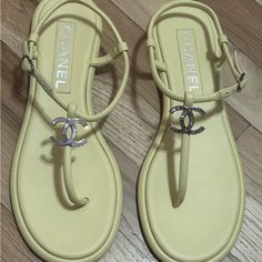 Brand New In Box Never Worn Size 41 Chanel Sandals. Ships With Dust Bags. Never Work However One Shoe Has Discolored Sole At Heel. I Guess From Being Tried On In The Boutique? Hard To Find Pair, Sold Out Everywhere Summer 2023 Collection Chanel Thong Sandals, Chanel 2024, Chanel Slides, Shoes Chanel, Yellow Sandals, Chanel Sandals, Chanel Logo, Tory Burch Miller Sandal, Summer Sandals