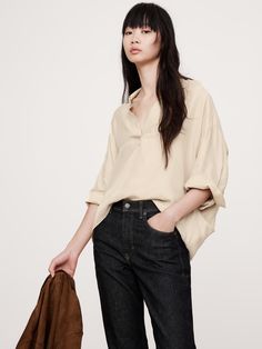 Cut for an oversized fit and longer length, this popover shirt is crafted from a silky, soft twill with fluid drape.  We left off the buttons this time, leaving the collar open for an at-ease appeal.  Oversized fit with a dropped shoulder.  Point collar.  Straight hem.  Unlined.  Oversized fit with a dropped shoulder.  3/4 sleeves.  Hip length.  Model: Size S, 5'10" (178cm). Popover Shirt, Top Banana, Big And Tall, Hip Length, Oversized Fits, First Look, Womens Clothing Tops, Personal Style, Cashmere