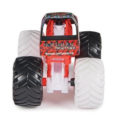 the monster truck is white and red with black tires