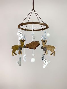 an image of a mobile with animals hanging from it