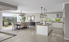 a large open kitchen and dining room area