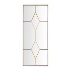 a white and gold door with an abstract design on the glass paneled window frame