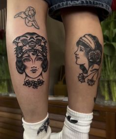 two women with tattoos on their legs