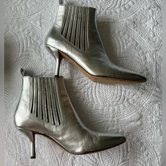 Boots Size 7,5 Metallic Silver Designer Boots With Sculpted Heel For Spring, Silver Leather Heeled Boots For Spring, Designer Round Toe Heeled Boots For Spring, Designer Boots With Reinforced Heel For Spring, Spring Party Calf Leather Heeled Boots, Formal Boots With Heel Tab For Spring, Spring Formal Boots With Heel Tab, Formal Spring Boots With Heel Tab, Spring Party Calf Leather Boots