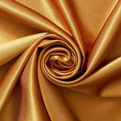 a close up view of an orange satin fabric