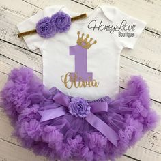 "LIKE our Facebook page to receive 10% OFF your first purchase! Send us a message after you LIKE us on Facebook and we will send you the code!! Join us on Facebook, Instagram and our NEW WEBSITE for all the latest designs, discounts, sales and giveaways! https://www.facebook.com/TheHoneyLoveBoutique https://instagram.com/honeyloveboutique www.HoneyLoveBoutique.com Your little princess will sparkle and shine in this glittery outfit on her First Birthday! {BODYSUIT} The number \"1\" is printed in Birthday Princess Outfit, Glittery Outfits, 1st Birthday Princess, Bow Cake, Birthday Bodysuit, Her First Birthday, Princess Outfit, Gold First Birthday, Purple Tutu