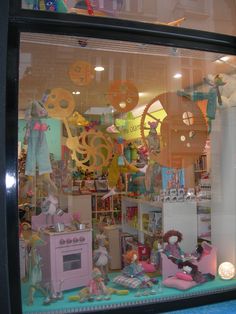 there is a window display with toys in it