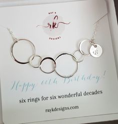 60th birthday gift for her. Sterling silver six circle link necklace with initial tag. very lightweight six various sized circles from small to large.  sterling silver fine chain five circle link-73x18mm Personalized Sterling Silver Jewelry For Birthday, Nickel Free Round Jewelry For Birthday, Nickel-free Sterling Silver Jewelry For Birthday, Silver Round Pendant Jewelry For Birthday, Minimalist Nickel-free Jewelry For Birthdays, Nickel Free Minimalist Jewelry For Birthday, Silver Round Jewelry For Birthday, Minimalist Hypoallergenic Jewelry For Birthday, Sterling Silver Round Jewelry For Birthday