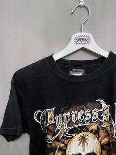 Cypress Hill Vintage Tshirt. Date: 90s Size: M No significant flaws. Some cracking to print. Very boxy fit, as was the style in the 90s. Pit-to-pit: 47cm Length: 63cm Y2k Skull Print Crew Neck T-shirt, Y2k Skull Print Streetwear T-shirt, Oversized Grunge T-shirt With Skull Print, Acid Wash Punk T-shirt With Graphic Print, 90s Oversized Logo Print T-shirt, Vintage Short Sleeve T-shirt With Skull Print, Oversized 90s T-shirt With Logo Print, Vintage Skull Print Tops For Streetwear, Acid Wash Tops With Front Print For Streetwear