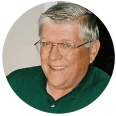 an older man wearing glasses and smiling for the camera in a round photo with a white background