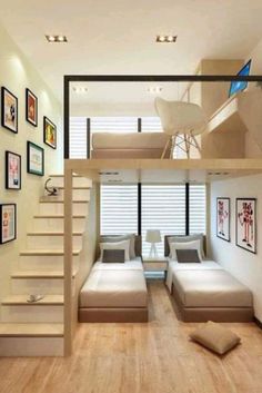 a living room filled with furniture next to a stair case under a loft style bed