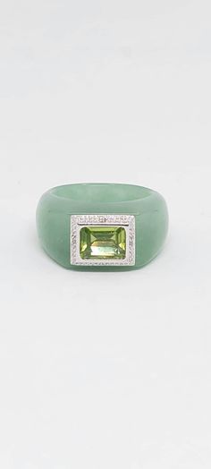 GREEN Jade Faceted Peridot 14k White Gold diamonds Ring, Gift for him or her. Green Jade Gold diamonds Ring. JADE LOVER. Grade A. Natural Color Product Info: - Stone: Green Jade / Square Faceted Peridot / Diamonds. - Gemstone Color: Green Jade/Peridot/ diamonds. - Jade: 10mm thick. - Faceted Peridot: 5x6mm - Metal: 14k. -Finished: White Gold. - Ring Size Available: 7 - Nice Gift Box Included. 14k White Gold Diamond Ring, Diamonds Ring, Jade Ring, White Gold Diamond Rings, Green Jade, Jade Green, Diamond Gemstone, Gemstone Colors, White Gold Diamonds