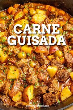 a close up of food in a pan with the words carne gusada