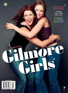 two young women hugging each other on the cover of glamour girls magazine, with stars in the background